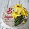 Gingerbread cookies casket with decor on 8 March holiday - yellow daffodils, the inscription in Russian 8 March - on wooden