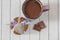 Gingerbread cookies, cup of cocoa, milk chocolate and metallic hearts. Valentines day Celebration