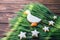 Gingerbread cookies shaped duck and stars with ear of wheat on a wooden background. Shallow depth of field.