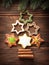 Gingerbread cookies stacked as christmas tree.