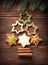 Gingerbread cookies stacked as christmas tree.