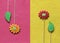 Gingerbread flowers and leafs on yellow and pink felt background
