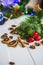 Gingerbread in the form of stars, red Christmas balls, dried lemons, cinnamon and green garland and lights