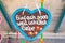 Gingerbread heart in german tradition christmas market. Text translation `just because i love you`