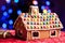 Gingerbread house decorated with colorful candies