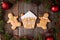 Gingerbread house, man and woman cookies