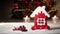 Gingerbread house and rowan berries. Snow, candles and Christmas tree