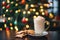 gingerbread latte beside a christmas tree, lights in soft focus