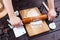 Gingerbread making. Woman rolling the dough with rolling pin on