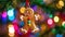 Gingerbread Man Cookie in Christmas Tree with Bokeh Lights. Festive Decoration and Closeup Magic for New Year