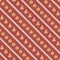 Gingerbread seamless pattern with diagonal stripes on red background. Festive Christmas pattern with Christmas trees and balls