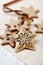 Gingerbread stars on baking paper