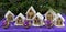 Gingerbread sweet christmas houses with purple balls in christmas, horizontal