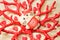 Gingerbread sweet little cat in red coral shape vase