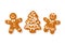 Gingerbreade man, woman and Christmas tree. Traditional homemade sugar coated cookies isolated