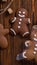 Gingerbreadman on brown wooden background