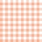 Gingham pattern in pastel orange and white. Seamless vichy check plaid.