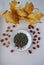 Ginseng oolong Chinese tea on a white plate with nuts, autumn leaves