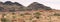 Giraffes dwarfed by vast landscape, Augrabies Falls National Park , South Africa