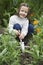Girl 5-6 gardening portrait