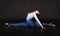 Girl acrobat, gymnastics, a young athlete in a blue and white suit , practicing acrobatics. Isolated images on white background