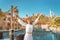 Girl admires the beautiful view of the Madinat Jumeirah Hotel and Mall. Travel and tourism in Dubai and United Arab Emirates