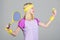 Girl adorable blonde play tennis. Start play game. Sport for maintaining health. Athlete hold tennis racket in hand