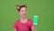 Girl advertises the phone. Green screen