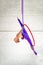 Girl aerial gymnast on a circle doing acrobatic elements