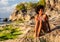 Girl with afro hairstyle at Padang Padang beach