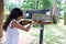 Girl aiming target with rifle at sports centre