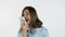 Girl Answering Call on Phone, White Background in Studio