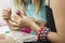 Girl Applying Nail Polish To Friend\'s Fingernails