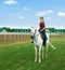 Girl astride a horse