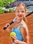 Girl athlete with racket and ball on tennis