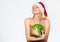 Girl attractive naked wear santa hat hug watermelon white background. Winter detox concept. How to detox after christmas