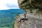 A girl on the background of the landscape of the Caucasus Mountains - The Eagle Rocks Mountain shelf, Mezmai.