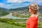 A girl on the background of a view of the Mtkvari River flowing into the Aragvi River. Mtskheta Georgia 2019