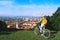 Girl with backpack and bicycle explores Ljubljana. Travel Slovenia