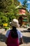 Girl with backpack entering to Quan Yin Shrine.