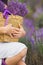 Girl with a basket of flowers lilac lavender