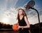 Girl with Basketball and Hoop