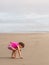 Girl beach combing