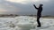 Girl beautifully dances near the gulf during the winter period.