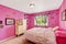 Girl bedroom interior in bright pink color