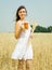 Girl with beer at field