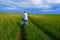 Girl with bike in field