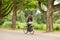 Girl biking in the Amsterdam Vondelpark