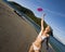 Girl in bikini catching a frisbee - tropical beach