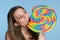 Girl Biting Lollipop